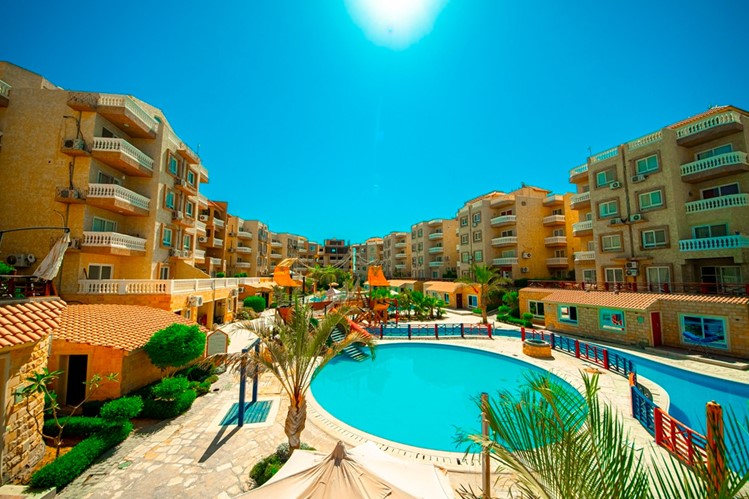 chalet in front of the swimming pool